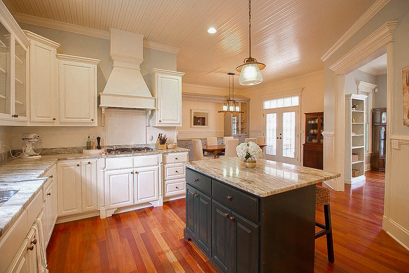 Before and after photos of Charleston home renovations showing foreclosures transformed into dream homes.
