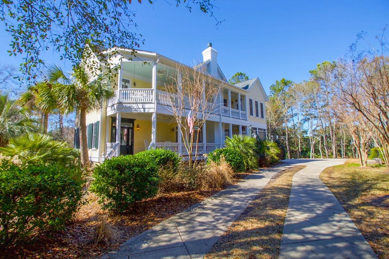 Before and after photos of Charleston home renovations showing foreclosures transformed into dream homes.