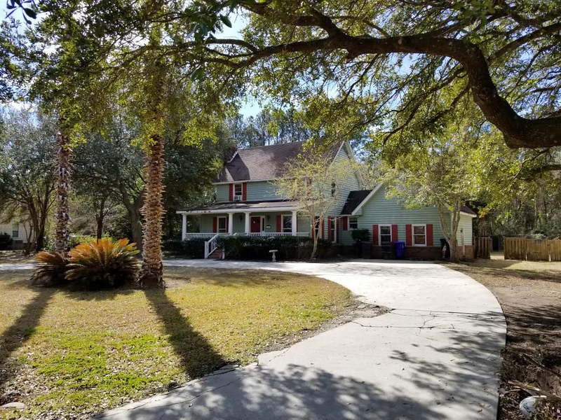Before photos of a foreclosure home with a pool and spacious yard ready for renovation.