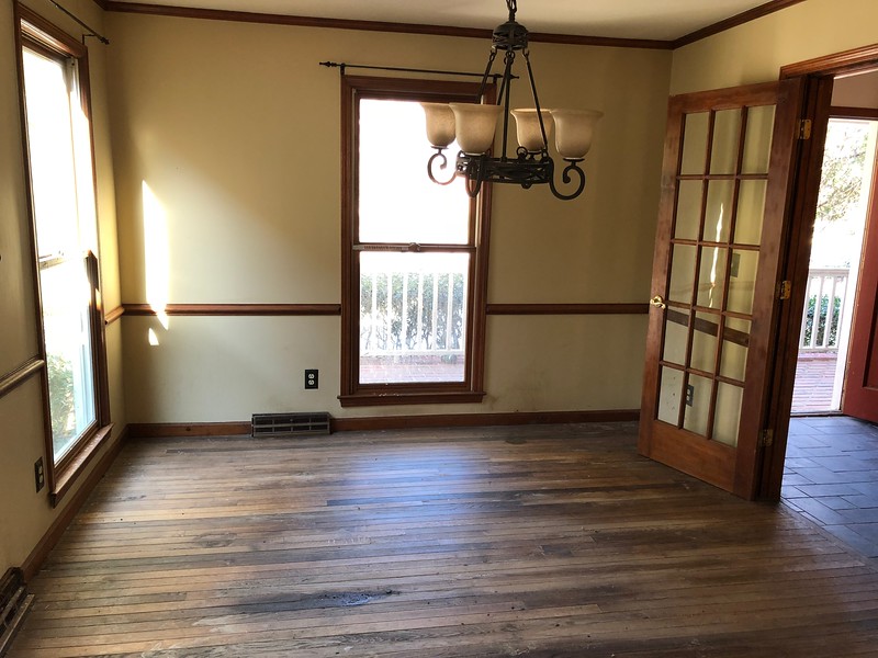 Before photos of a Mount Pleasant house foreclosure set for renovation with a pool and spacious yard.