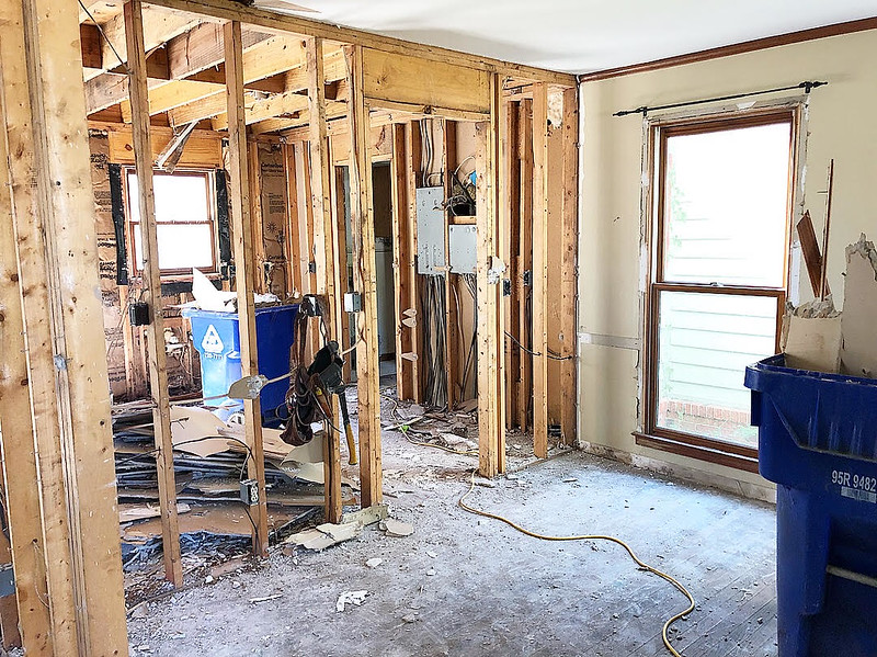 Before photos of a Mount Pleasant house foreclosure set for renovation with a pool and spacious yard.